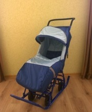 Продам новые санки-коляску